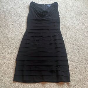 Perfect little black dress with scoop neck and flutter tiers.